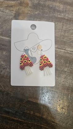 Hand beaded brick stitch earrings. Super cute mushroom design. These earrings are small and do not have a long dangle. Beaded Mushroom Earrings, Beaded Brick Stitch, Beaded Mushroom, Earrings Mushroom, Stitch Earrings, Mushroom Earrings, Cute Mushroom, Brick Stitch Earrings, Mushroom Design