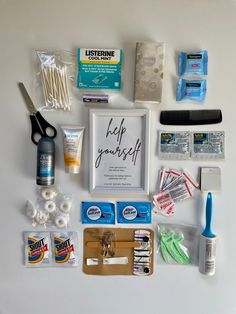 the contents of a crafting kit laid out on a white surface with scissors, glue, toothpaste and other items