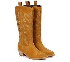 Give your personal style a flash of Western pizzazz by pulling on these iconic cowboy boots dressed up with distinctive stitching and a sturdy block heel. From Saint G. Western Block Heel Boots For Fall, Western Boots With Block Heel For Fall, Fall Square Toe Heeled Boots For Western-themed Events, Square Toe Heeled Boots For Western-themed Fall Events, Western Mid-calf Boots With Stacked Block Heel, Western Block Heel Boots For Winter, Western Style Block Heel Heeled Boots For Winter, Trendy Leather Boots For Western-themed Events, Brown Western Boots With Block Heel