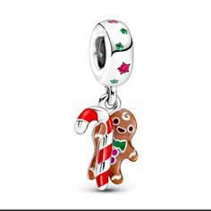 Brand New Silver And Enamel Gingerbread Man W/Candycane And Crystal Accents. For Diy Charm Bracelets. Fits All European And Most Name Brand Bracelets, Such As Pandora. All Diy Charms, Beads, And Bracelets Are B1g1 Free, Or 1/2 Price In General, When Buying 2 Or More. Free Gift With Every Purchase! All Reasonable Offers Are Welcome. I Can’t Say Yes, If You Don’t Ask! Thank You For Looking Through My, And Happy Poshing! Charms Disney, Silver Icing, The Gingerbread Man, Pandora Jewelry Charms, Life Is Sweet, Charms Pandora, Christmas Gingerbread Men, Bracelet Pandora, Jewelry Charms Pendants