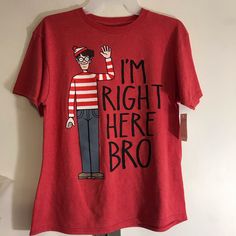 This Is A New Never Used Fun Novelty "Where's Waldo" Tee Shirt For Youth Sizes 8 And 18. Waldo Is Answering The Question By Saying "I'm Right Here Bro" 50% Cotton, 50% Polyester. Tagless Tee. Funny Red Tops With Cartoon Print, Red Shirt With Funny Print And Relaxed Fit, Red Shirt With Funny Print Relaxed Fit, Red Cotton Shirt With Funny Print, Red Relaxed Fit Shirt With Funny Print, Funny Red Top With Character Print, Funny Red Tops With Character Print, Red Fun Top With Funny Print, Red Funny Print Top