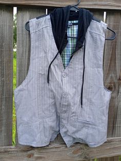 This reversible vest can be formal in the colors of grey, black or in the form of casual with a green blue white plaid vase. It has grey bottom for a formal look or a zipper for a casual look. Great piece. This vest is an xl size, mark carbon, 65 % polyester and 35 % rayon. Note:  If for male it may fit a large size and for female it will fit  an XL size is my opinion. Mens Formal Vest, Formal Vest, Plaid Vest, Reversible Vest, Mens Vests, Mens Formal, Vest Outfits, Formal Looks, Photo Colour