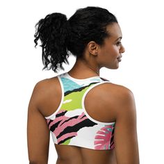 This gorgeous pink art sports bra is made from moisture-wicking material that stays dry during low and medium intensity workouts. The bra has support material in the shoulder straps, double layer front, and a wide elastic band to ensure constant support.• 82% polyester, 18% spandex• Fabric weight: 6.78 oz/yd² (230 g/m²), weight may vary by 5%• Moisture-wicking fabric• Four-way stretch material• Scoop neckline and racerback• Flat seams and bias binding that minimize rubbing• Best for A–C cups• Support material in the shoulder straps, double-layered front, and a wide elastic band under breasts for extra supportThis product is made especially for you as soon as you place an order, which is why it takes us a bit longer to deliver it to you. Making products on demand instead of in bulk helps re Multicolor Stretch Sports Bra For Gym, Multicolor Sports Bra For Yoga, Multicolor Sports Bra For Summer, Multicolor Racerback Activewear For Sports, Multicolor Sports Bra For Training, Multicolor Sleeveless Sports Bra For Sports, Multicolor Sleeveless Sports Bra For Yoga, Multicolor Sleeveless Sports Bra, Sporty Multicolor Sports Bra For Gym