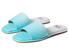 MICHAEL Michael Kors Hayworth Slide - Women's Shoes : Ocean Blue : Complement your cool and comfy warm weather style wearing the MICHAEL Michael Kors Hayworth Slide Sandals. Synthetic upper, lining, and insole. Slip-on style for easy on/off. Open square toe. Ombré effect with logo detailing. Synthetic outsole. Imported. Measurements: Heel Height: 1 4 in Weight: 8 oz Product measurements were taken using size 9, width M. Please note that measurements may vary by size. Weight of footwear is based Spring Sandals With Cushioned Footbed For Leisure, Cushioned Sandals For Leisure And Spring, Comfortable Slides For Leisure In Spring, Modern Blue Slides For Summer, Comfortable Summer Slides With Textured Sole, Casual Summer Slides With Textured Sole, Casual Open Toe Textile Sandals, Casual Lightweight Slides, Casual Sandals With Branded Insole