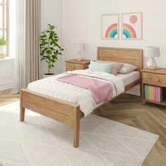 a bed room with a neatly made bed and two nightstands next to each other