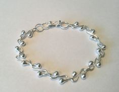 This elegant bracelet is made by Peruvian Artisans with high quality 950 sterling silver. The bracelet measure 20 cm Weight: 10.4 grams Metal: 950 Sterling silver Origin: Peru Bracelet is perfect to wear everyday and all occasions If you have any question please don't hesitate to contact me Thank for looking: Visit my shop for more unique jewelry https://www.etsy.com/your/shops/PeruMuchikstore Turquoise Silver Bracelet, Women Bracelet, Bracelet Women, Pompano Beach, Handmade Wire Jewelry, Elegant Bracelet, Bracelet Sterling Silver, Bracelet Beaded, Dainty Bracelets