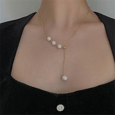 Gorgeous stunning lariat Y shaped gold layering necklace, with natural freshwater pearls bead and drop. Delicate and elegantly feminine. Chain is 48cm length adjustable, you can adjust the chain at your preference, super convenient. Gold plated color will last beautiful longer than others. ♥ All of our jewelry are carefully handmade with delicate and exquisite details, all designed and made in Manhattan, New York. 💎 Features: ♥ Made to Order ♥ Material: gold plated brass ♥ Main stone: Freshwater pearl 💎 Details: ♥ Approximate Measurements: - Length:48cm adjustable ♥ Lightweight, easy to wear ♥ Nickel/Lead Free, Hypoallergenic 💎 Packing & Shipping: ♥ All our jewelry will be shipped with beautiful gift wrap packaging ♥ Handwrite gift notes/cards available upon request ♥ FREE US Domestic S Made In Manhattan, Pearl Necklace Gold, Pearl Lariat Necklace, Pearl Lariat, Princess Earrings, Soiree Dress, Pearl Chain Necklace, Baroque Pearl Earrings, Y Necklace