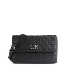 Gender:Woman Type:Clutch Material:Polyester Main Fastening:Zip Handles:1 Handle Shoulder Strap:Removable Shoulder Strapadjustable Shoulder Strap Inside:2 Compartmentslined Internal Pockets:2 Width Cm:24 Height Cm:15 Depth Cm:4 Details:Visible Logo Black Clutch Bags, Calvin Klein Handbags, Calvin Klein Bag, Black Clutch, Black Leather Purse, Ladies Clutch, Calvin Klein Women, Black Leather Handbags, Large Shoulder Bags