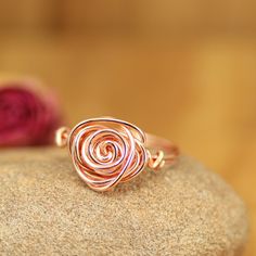 This flower ring is so cute and pretty. I use a copper wire to wire wrap a dainty ring in a rose shape. Note the little details on the side, looking like a stem maybe. This elegant flower ring would be a great gift for your BFF or your girlfriend who loves nature and flowers. ~ Each ring will be handmade by me for you, and each one will be unique. Like with Mother Nature, no two flowers can be exactly alike! ~ This flower ring will be handmade with a thin copper wire at your size. This rose ring Sterling Silver Midi Rings, Engagement Ring Nature, Wire Wrapped Rose, Mid Finger Rings, Midi Rings Silver, Ring Sets Boho, Silver Toe Rings, Nature Ring, Rose Ring