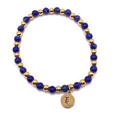 Blue Lapis Lazuli and Gold Beaded Stretch Bracelet Accented with 18K gold filled 4mm beads 4mm deep blue lapis beads Every bracelet I design is carefully thought out and crafted. Each individual bead is selected for its color, vibrancy, and size. I pay careful attention to how each bracelet lays on the wrist, how they nestle together as a stack, and how comfortable they are to wear together and individually. size: small 6.5" - 7"size: med 7" - 7.5" Lapis Lazuli Beaded Bracelets With Polished Round Beads, Gold Lapis Lazuli Beaded Bracelets With Round Beads, Gold Lapis Lazuli Bracelets For Gift, Hand-strung Gold Lapis Lazuli Bracelets, Gold Beaded Lapis Lazuli Bracelets, Gold Lapis Lazuli Spiritual Bracelets, Gold Stretch Bracelet With Gemstone Beads, Gold Charm Bracelet With Gemstone Round Beads, Lapis Lazuli Blue