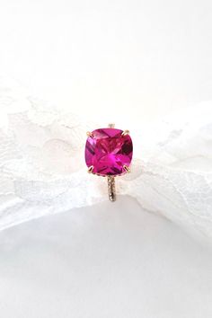 14k Gold Pink Ruby Ring Birthstone, Pink Ruby Birthstone Ring In 14k Gold, Dainty Pink Solitaire Ring, Gold Pink Sapphire Birthstone Ring Gift, Pink Ruby Birthstone Ring With Prong Setting, Pink Ruby Ring Fine Jewelry Birthstone, Pink Ruby Ring With 14k Gold, Ruby Birthstone Ring With Pink Center Stone, Rose Gold Jewelry With Accent Stones As Gift