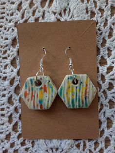 I create all these pretties you see here by hand. Each of my pieces are totally unique and with their own character. I design and carve them all myself from using Earthenware Clay before being painted using a mixture of Clay slips and Underglazes. Varying Blues, Orange, Yellow and Lime Green's are applied to the front and sides of the earrings, leaving the rear unglazed so the natural quality of the clay can be appreciated.  Much of the initial inspiration came from admiring our Atlantic Ocean r Handmade Multicolor Crafts Gift, Handmade Multicolor Crafts As Gifts, Handmade Multicolor Crafts For Gifts, Handmade Multicolor Crafts For Gift Making, Artistic Handmade Crafts As Gifts, Handmade Artistic Crafts For Gifts, Artistic Handmade Crafts For Gifts, Handmade Artsy Earrings, Diy Multicolor Handmade Crafts