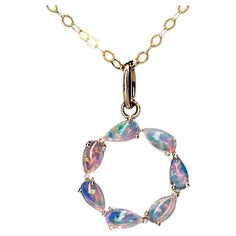 Eternity Love Australian Crystal Opal Circle Necklace Pendant 14K Yellow Gold. Free Domestic USPS First Class Shipping!  Free One Year Limited Warranty!  Free Gift Bag or Box with every order! Opal—the queen of gemstones, is one of the most beautiful and rarest gemstones on earth.  Every piece of opals has its colors and patterns, which is perfect for designers to create unique engagement rings for someone extra special.  We use 100% Natural & Ethically opal stones (NO synthetics or imitations) Yellow Gold Necklace With Jeweled Round Pendant, Yellow Gold Jeweled Round Pendant Necklace, Multi-stone Round Pendant Necklace For Anniversary, Yellow Gold Necklace With Jewels In Round Pendant, Yellow Gold Multi-stone Round Pendant Jewelry, Yellow Gold Round Pendant Necklace With Jewels, Yellow Gold Jewelry With Round Pendant, Opal Multi-stone Pendant Necklace, Opal Round Pendant Necklace For Anniversary