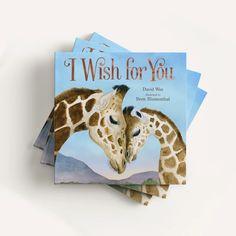 i wish for you book with two giraffes kissing each other's forehead