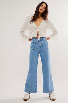 High-waisted jeans featured in a wide-leg silhouette. * Authentic denim * Front and back patch pockets * Button closure and zip fly | Rolla’s Sailor Jeans by Rolla's at Free People in Light Wash, Size: 32 Front Pocket Jeans Outfit, Rollas Sailor Jean, Sailor Jeans Outfit, Light Denim Outfit, Highwasted Jeans, Preppy Jeans, Bell Bottom Jeans Outfit, Rollas Jeans, Sailor Jeans