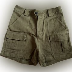 Nwot - Army Green Cargo Shorts. Very Cute, High-Waisted. These Shorts Are Perfect, Brand New, Never Worn. All Pockets Useable. Labeled Size Is Xs Or But It’s About A S, But Please See Measurements In The Photos. It Is Nwot, It Only Came In A Bag, No Tag. Cheap Khaki Mini Skirt With Pockets, Cheap Green Beachy Bottoms, High Rise Cotton Cargo Shorts, Khaki Bottoms With Pockets And Short Inseam, Mid-rise Utility Shorts With Hip Pockets, Utility High Waist Shorts With Hip Pockets, Utility High-waisted Shorts With Hip Pockets, High-waisted Utility Cargo Shorts, High-waist Utility Shorts With Hip Pockets