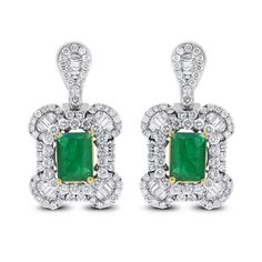 Designed for simplicity & statement, these earrings are a timeless and creative pair. Gemstones Type: Emerald Gemstones Shape: Rectangular Gemstones Weight: 3.12 Gemstones Color: Green Diamonds Shape: Round & Baguettes Side Diamonds Weight: 2.50 ct Side Diamond Color: F - G Side Diamond Clarity: SI (Slightly Included) Metal: 18K White Gold Metal Wt: 8.32 gms Setting: Prong, Pave & Channel Set Length: 1.1 Inches (2.79 cm) Non Threaded Post & Omega Back Closure Green Diamonds, Green Diamond, Emerald Earrings, Channel Set, Emerald Gemstone, Diamond Color, Emerald Diamond, Diamond Clarity, Gemstone Colors