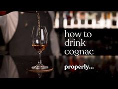 a person pouring wine into a glass on top of a table with the words how to drink cognac properly