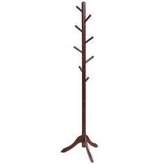 a wooden coat rack with three trees on it