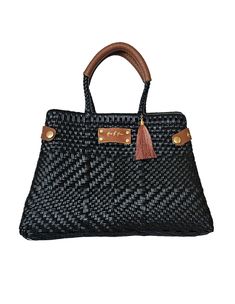 Indulge in luxury while doing your part for the environment with our Less Pollution Convertible Handbag! Handwoven with sustainable materials, this elegant black pearl bag can easily transform into a convenient tote bag. Complete with leather handles, experience style and sustainability all in one bag. HandwovenLined with one zipper pocketMagnetic closure for tote bag.Versatile bag (Tote bag)Made from recycled plasticUpcycle Genuine Leather Straps15" L x 10"H x 6" W Black Designer Handbags, Convertible Handbag, Upcycled Leather, Pearl Bag, Unique Bags, Eco Friendly Fashion, One Bag, Handbags Online, Leather Handles