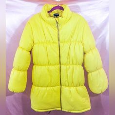 Epic Yellow Puffer Jacket New Yellow Spring Outerwear With Pockets, Spring Yellow Outerwear With Pockets, Yellow Winter Puffer Jacket, Oversized Casual Puffer Jacket For Spring, Yellow Spring Puffer Jacket, Yellow Casual Puffer Jacket For Spring, Yellow Casual Spring Puffer Jacket, Casual Yellow Puffer Jacket For Spring, Casual Yellow Spring Puffer Jacket