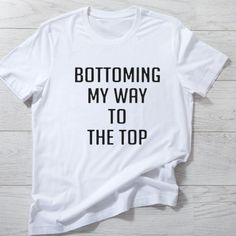 Bottoming My Way To The Top Shirt, Gay Shirt, Pride Shirt, Lgbt Shirt Discover Our Latest Collection Of T-Shirts, Featuring The Gildan 5000 Series, Where Style Meets Comfort Effortlessly!Available In Sizes Ranging From S To 3xl, In An Array Of Vibrant Colors. Meticulously Crafted For Lasting Comfort And Resilience. Enjoy Prompt Shipping For Added Convenience. Need To Make Changes To Your Order? Contact Us After Your Purchase! Cheap White T-shirt For Pride, Casual Slogan T-shirt For Pride, Short Sleeve T-shirt With Funny Print For Pride, Cheap Text Print T-shirt For Pride, Gay Shirts, Pride Slogan T-shirt Short Sleeve, Lgbt Shirts, Class Shirt, Harley Davidson Men