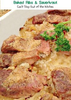 baked ribs and sauerkraut in a casserole dish with parsley