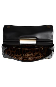 Inspired by the rich beauty of Sicily, this sleek patent bag designed to be carried by hand is finished with understated logo hardware on the flap. The fashion house's iconic leopard print makes an appearance on the lining. Magnetic-snap flap closure Top carry handle Interior zip pocket Leopard-print lining Leather Made in Italy Designer Handbags Designer Shoulder Bag With Fold Over Clasp, Luxury Satchel Shoulder Bag With Fold Over Clasp, Luxury Shoulder Bag Satchel With Fold Over Clasp, Luxury Double Flap Shoulder Bag With Top Carry Handle, Luxury Flap Bag With Top Carry Handle, Luxury Bags With Fold Over Clasp And Double Flap, Luxury Bag With Fold Over Clasp And Double Flap, Luxury Bag With Double Flap And Fold Over Clasp, Designer Flap Bag With Fold Over Clasp