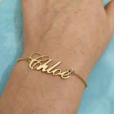 14k Real Gold - Personalized Jewelry - Name Bracelet - Nameplate Bracelet - Custom Bracelet - Personalized Gift - Christmas Gift - Chloe . . . . . . . . . . . . . . . . . . . . . . . . . . . . . . . . . . . . . . . . . . . . . . . . . . . . . . . . . . . Looking for a thoughtful gift for your loved one? You will love this high quality 14k Real Gold Personalized Jewelry Name Bracelet. This is a perfect gift for your girlfriend or wife. This lovely 14k Solid Gold Nameplate Bracelet is made to orde Gold Nameplate Chain Bracelet With Name, Gold Chain Bracelet With Custom Name For Personalized Gift, Customized Gold Chain Bracelet For Personalized Gift, Gold Nameplate Chain Bracelet With Custom Name, Customized Gold Chain Bracelet For Anniversary, Custom Name Bracelets In 14k Gold, Elegant Customizable Gold Charm Bracelet, Customizable Gold Charm Bracelet As Gift, Yellow Gold Name Chain Bracelet Gift