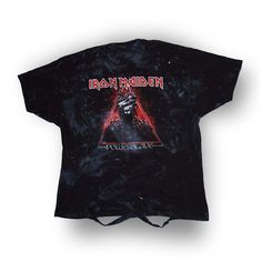 a black t - shirt with the image of darth vader in red on it