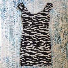 Fitted Black And White H&M Dress. Stretchy Material. Cap Sleeves. Size 4. Fits Like An Xs. Worn Once - Brand New Condition. Fast Shipper Top Rated Seller Posh Ambassador Questions Welcome Fitted Zebra Print Dress For Spring, Casual Fitted Mini Dress By H&m, Fitted H&m Mini Dress For Summer, H&m Fitted Mini Dress, Fitted Black And White Casual Dress, Casual Fitted Black And White Dress, Casual White Dress With Zebra Print, Casual Fitted Mini Dress In Black And White, Fitted White Dress By H&m