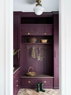 an image of a room with purple cabinets