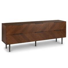 the sideboard is made from wood and has metal legs