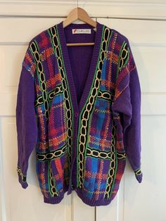 Funky Vintage 80’s Chaus Purple Cardigan Sweater with Plaid & Gold Sparkle. Shoulder pads. Size large. Pit to pit is 23”. Length is 31.5”. In nice vintage condition. Shipped with USPS Priority Mail.thanks for looking:) 80s Vintage Clothes, Purple Sweaters, Random Clothes, Purple Cardigan, Jim Carrey, Purple Sweater, Gold Sparkle, Cardigan Sweater, Priority Mail