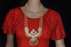 Most beautiful gold replica pachi work pendent set with emrald beads look.very grand and real one perfect for a Indian bridsl Gold Kundan Necklace With Stone Work For Puja, Elegant Kundan Necklace With Zari Work For Puja, Festive Mala For Puja With Stone Work, Heavy 22k Gold Kundan Necklace For Puja, Gold Jewelry Set With Stone Work For Puja, Heavy Temple Jewelry Pearl Necklace For Diwali, Temple Jewelry Mala With Stone Work For Puja, Festive Mala With Stone Work For Puja, Gold Kundan Mala For Temple Jewelry