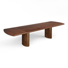 a wooden table sitting on top of a white floor