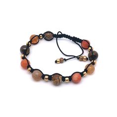 Handmade bracelet made of sturdy macramé cord with gemstone beads and gold-colored miyuki beads. The cord of the bracelet is adjustable with a sliding knot. Materials: * Macramé cord - black - 0.8 mm * Gemstone beads -Tiger Eye (brown/black) - Agate (orange) - Jade (orange) - Jasper (brown/beige) - 8 mm * Miyuki beads - gold - 4 mm Bracelet size = adjustable * Min. length - 18 cm * Max. length - 26 cm Gold Macrame Bracelets With Round Beads, Gold Macrame Beaded Bracelets, Gold Bracelets With Macrame Round Beads, Nylon Cord Bracelet, Shamballa Bracelets, Boho Bracelet, Bracelet Boho, Cord Bracelet, Sliding Knot