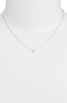 Personalize your stack with this layering-friendly necklace centered with a dainty pendant of your favorite initial filled with 14-karat yellow gold. 16" length 14k-gold fill Made in the USA Dainty Necklace Stack, L Initial Necklace, L Initial, Necklace Stack, 2025 Wedding, Gold N, Dainty Pendant, Initial Pendant Necklace, Initial Pendant