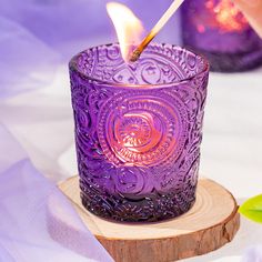 PRICES MAY VARY. PACKAGE INCLUDE: 12 pack clear sun moon stars embossed glass tea light holders. With a diameter of 2.2 inches and a height of 2.4 inches, making them perfect for tealight, votive, LED, floating candles, or flameless candles with a diameter of up to 1.8". A great addition to your table decor UNIQUE DESIGN(PATENTED): Our valentines votive candle holders feature a distinctive pattern meticulously crafted through our proprietary design process, setting the boho votive candle holders Tea Light Candle Holders, Votive Candle, Amethyst Purple, Light Candle, Votive Candle Holders, Moon Star, Sun Moon, Table Centerpieces, Tea Light Candle