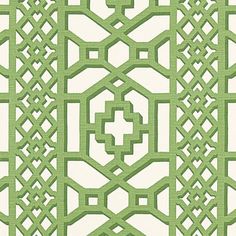 an intricate design in green and white