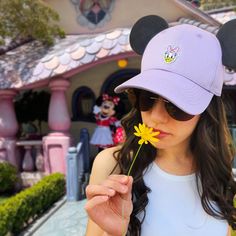 Our 'Daisy' high ponytail hat is made of 100% high quality cotton to be both lightweight and durable. It features an embroidered vibrant Daisy Duck patch, and two premium black mouse ears made to stand up... even on the wildest rides! Details: ONE SIZE FITS MOST ADULTS: Ball cap features an adjustable metal slider on the back of the hat to allow for easy resizing for a snug and comfortable fit 100% COTTON excluding decoration: Adjustable hat is composed of lightweight and durable cotton fabric, Adjustable Novelty Baseball Cap For Spring, Adjustable Minnie Mouse Cap, Mickey Mouse Baseball Cap, One Size Fits Most, Fun Mickey Mouse Themed Hat One Size Fits Most, Casual Cotton Hats With Mickey Mouse Detail, Adjustable Mickey Mouse Fun Hat, Casual Mickey Mouse Baseball Cap, Casual Cotton Mickey Mouse Hats, Fun Mickey Mouse Hat