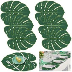 a table set with plates, forks and napkins on top of green leaf shaped place mats