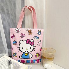 Adorable Hello Kitty Commuter Canvas Bag Authorized Sanrio Cartoon Design,Bag Durable, Water-Resistant, Perfect For School, Work & Travel Officially Licensed Product Good Quality! Fun Design! Pink School Bag With Cartoon Print, Pink Cartoon Print Travel Bag, Rectangular Bags With Cartoon Print For Daily Use, Pink Kawaii Bags For Everyday, Trendy Cartoon Print Bags For Daily Use, Trendy Bags With Cartoon Print For Daily Use, Pink Kawaii Everyday Bag, Cute Bags With Cartoon Print For Everyday Use, Cute Cartoon Print Bags For Everyday Use