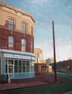 a painting of an empty street in front of a brick building with windows and a sign on the corner