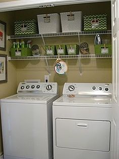 a washer and dryer in a small room