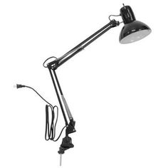 a black lamp on a white background with the cord plugged into it's base