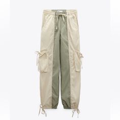 New Never Worn With Tags. Color: Ecru & Green Casual Beige Patchwork Pants, Beige Patchwork Pants For Spring, Cream Straight Cargo Pants For Spring, Spring White Color Block Pants, Casual Spring Cargo Pants With Patchwork, Beige Zara Cargo Pants With Pockets, Khaki Patchwork Bottoms For Spring, Zara Khaki Cargo Pants For Spring, Zara Beige Cargo Bottoms