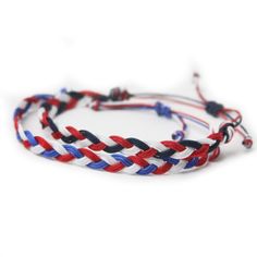 This Red, White, & Blue triple strand braid bracelet is a great complement to any bracelet stack, but simple enough to be worn alone. Available in Red, White & Blue or Red, White & Navy. Adjustable knot for easy on/off High Quality Nylon cord will not fray or break Save 10% on order of 3 bracelets or more! Blue Adjustable Bracelets For 4th Of July, Adjustable Friendship Bracelets For 4th Of July, Casual Multicolor Bracelets For 4th Of July, Casual Blue Bracelets For 4th Of July, Adjustable Bracelets For Beach And 4th Of July, Adjustable Beach Bracelets For 4th Of July, Red Adjustable Friendship Bracelets For Summer, Patriotic Adjustable Friendship Bracelets, Adjustable Patriotic Friendship Bracelets