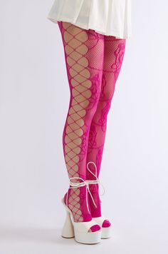 Add a bold punch of visual interest to your ensembles with The That Girl Cutout Tights. This sheer, ultra-stretchy pair combines fishnet and floral lace patterning, an elasticized waistband, unlined cut outs down the sides with criss-cross detailing, and a pull-on fit. - 80% Nylon 20% Spandex - Super Stretchy - Imported (all measurements are approximate from size O/S) - 6.25” Rise Unstretched, 25” Inseam Unstretched  Product ID: 394555 Pink Clothing Aesthetic, Fun Tights, Funky Tights, Cute Tights, Pink Clothing, Fest Outfits, Cut Clothes, Fashion Tights, Magenta Pink