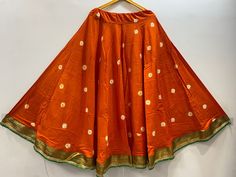 Dance Lehanga skirts for Garba/ dandiya Navratri season. fits regular size upto size 38/40. Colors available: orange and maroon. Orange Bollywood Choli With Bandhani Print, Orange Bandhani Print Sharara For Festivals, Traditional Orange Sharara With Bandhani Print, Traditional Orange Bandhani Print Sharara, Bohemian Orange Choli For Navratri, Orange Bohemian Choli For Navratri, Bohemian Orange Traditional Wear For Navratri, Traditional Skirt With Festive Patterns, Orange Choli For Puja And Navratri